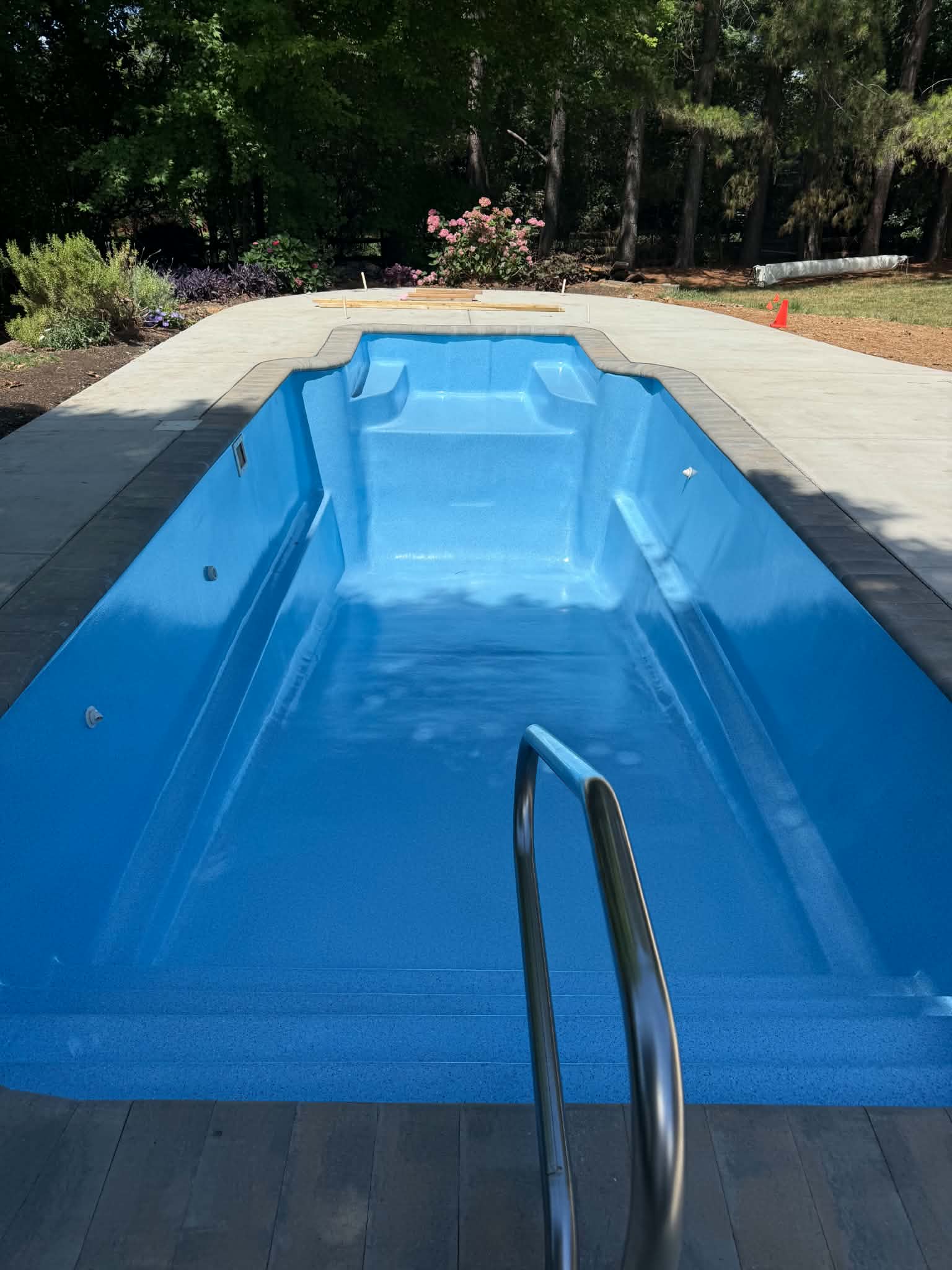 Completed blue swimming pool