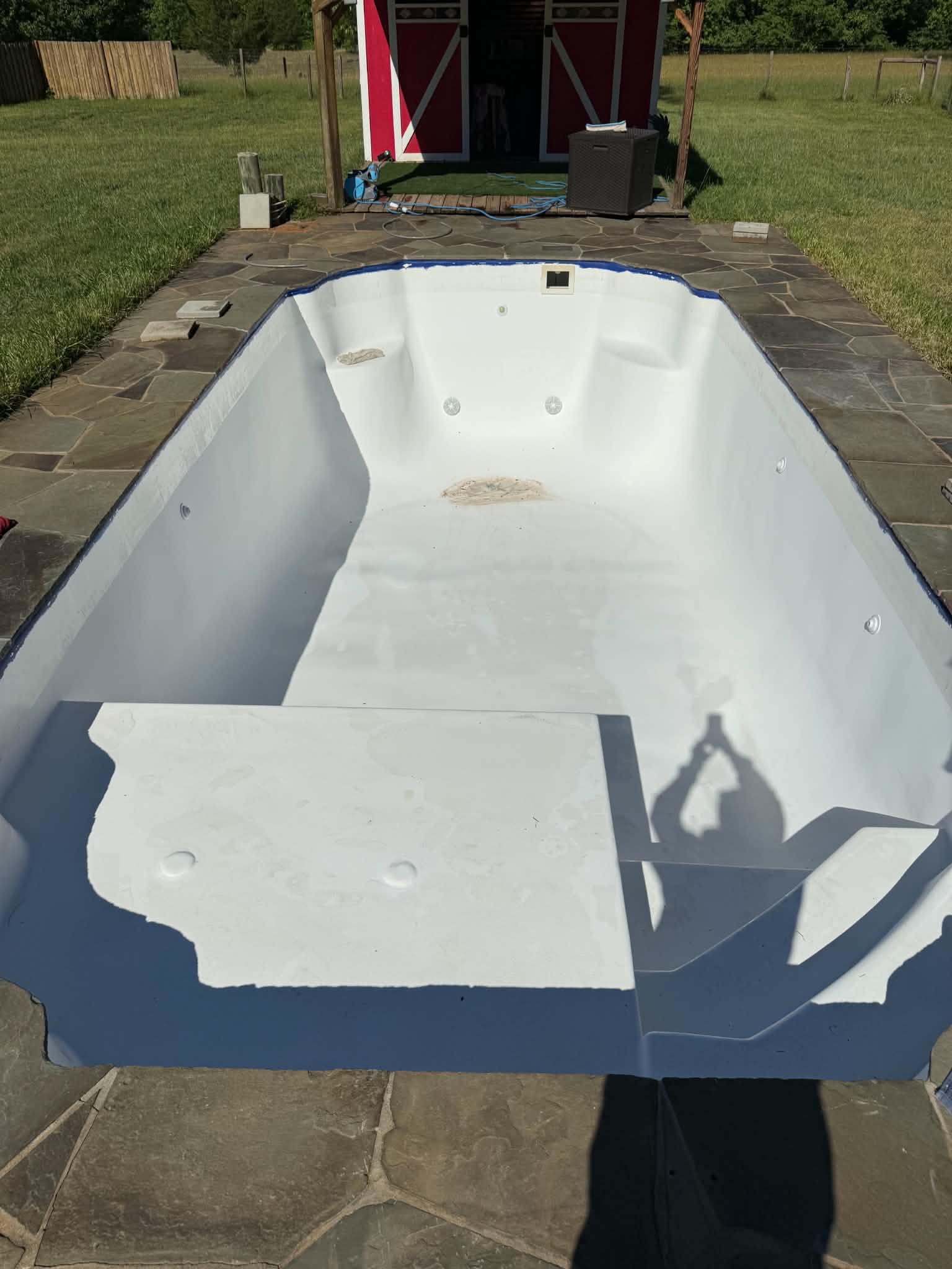 Fiberglass pool with fresh white base coating