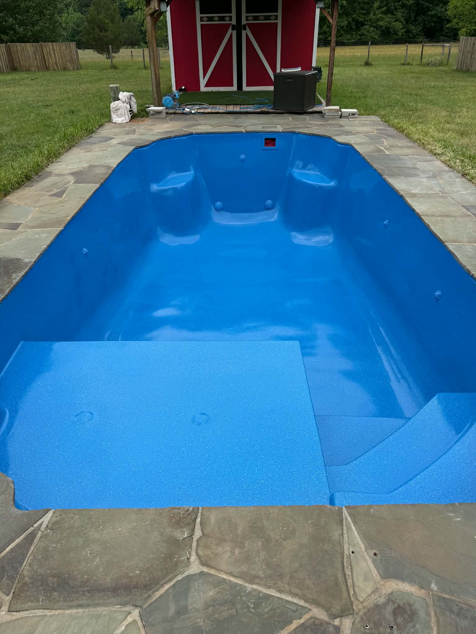Finished blue pool from a second angle