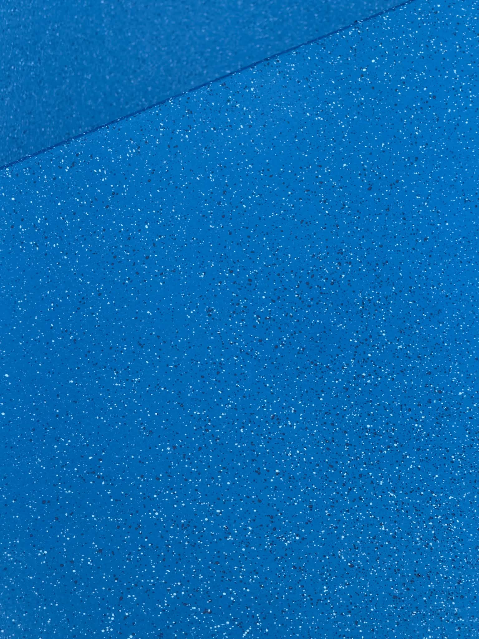Royal-blue pool coating with fine speckles