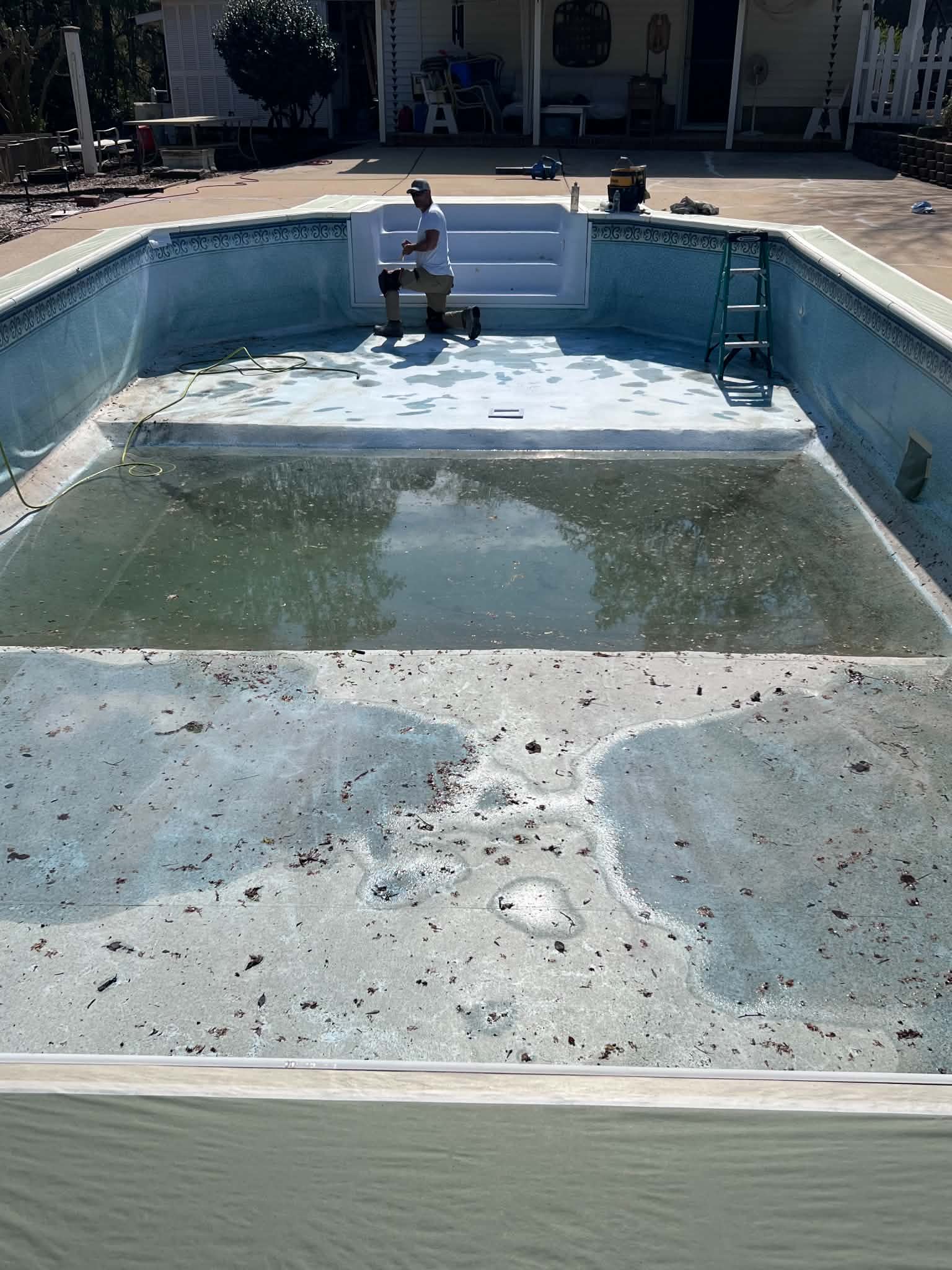 Drained pool with widespread surface deterioration