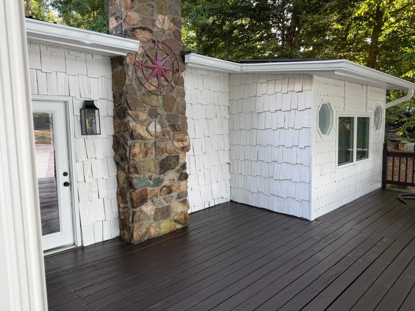 Newly painted shingle-style siding detail
