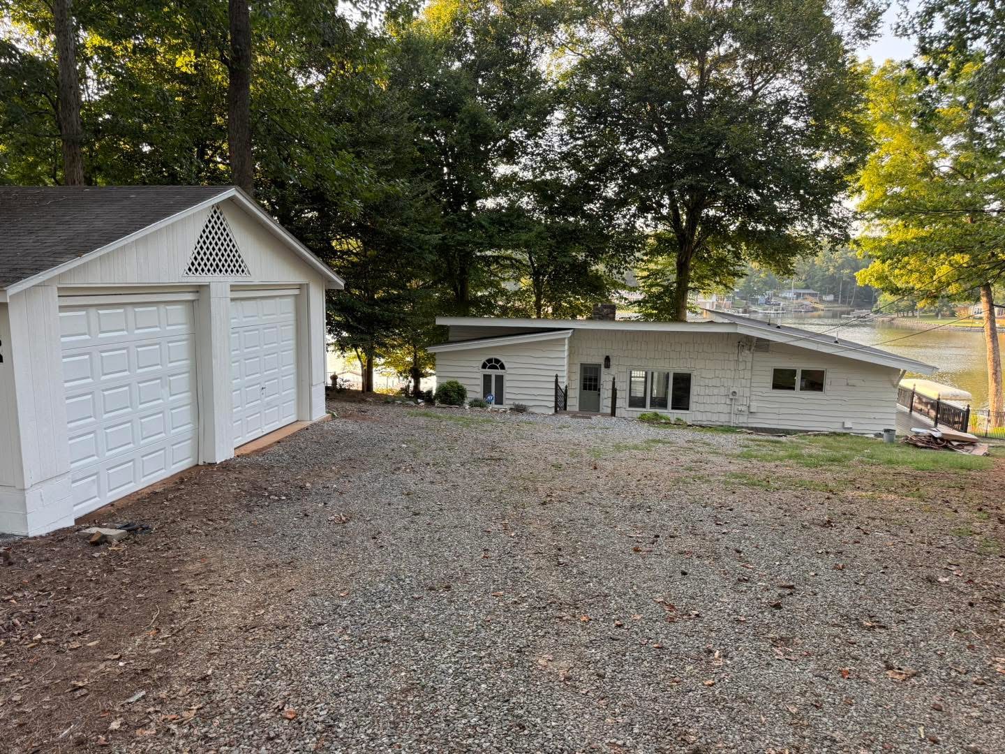 House and garage overview after exterior painting