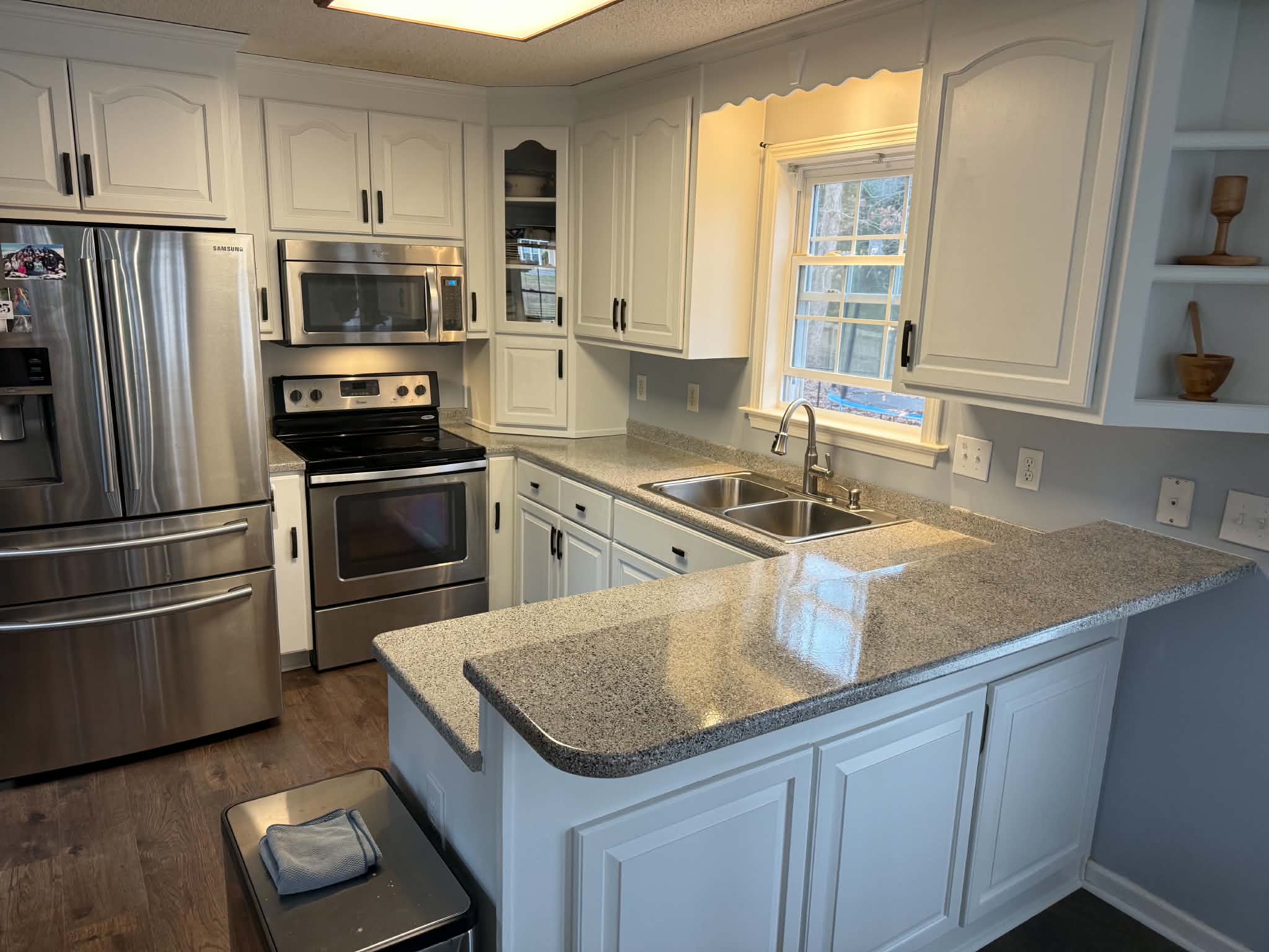 Completed white kitchen cabinets