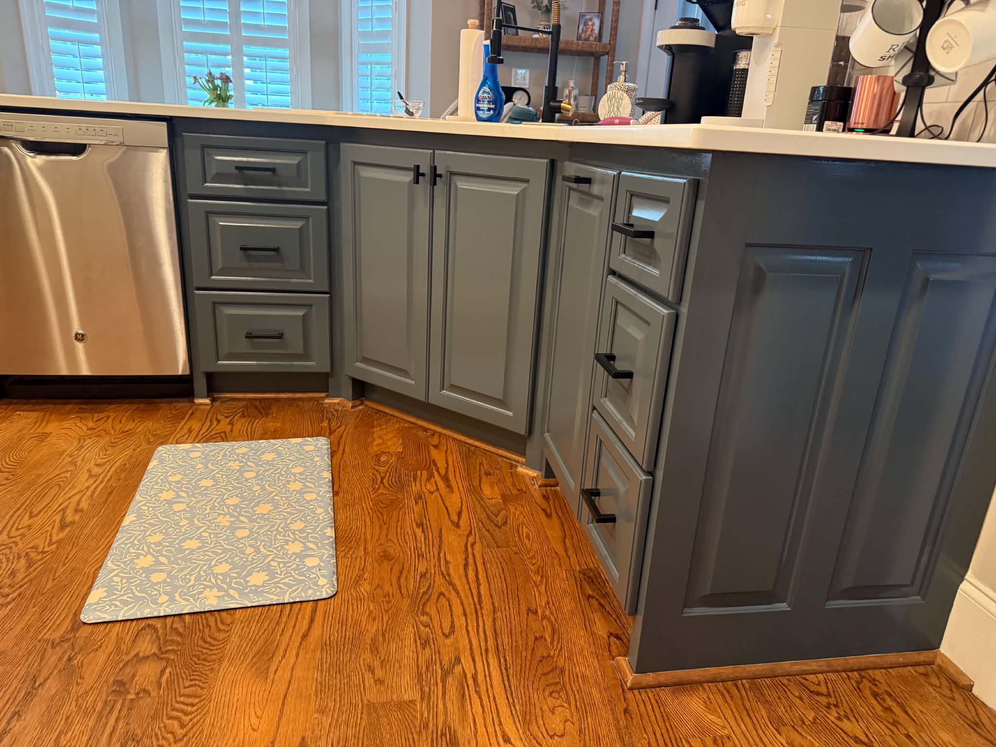 Completed gray kitchen cabinets
